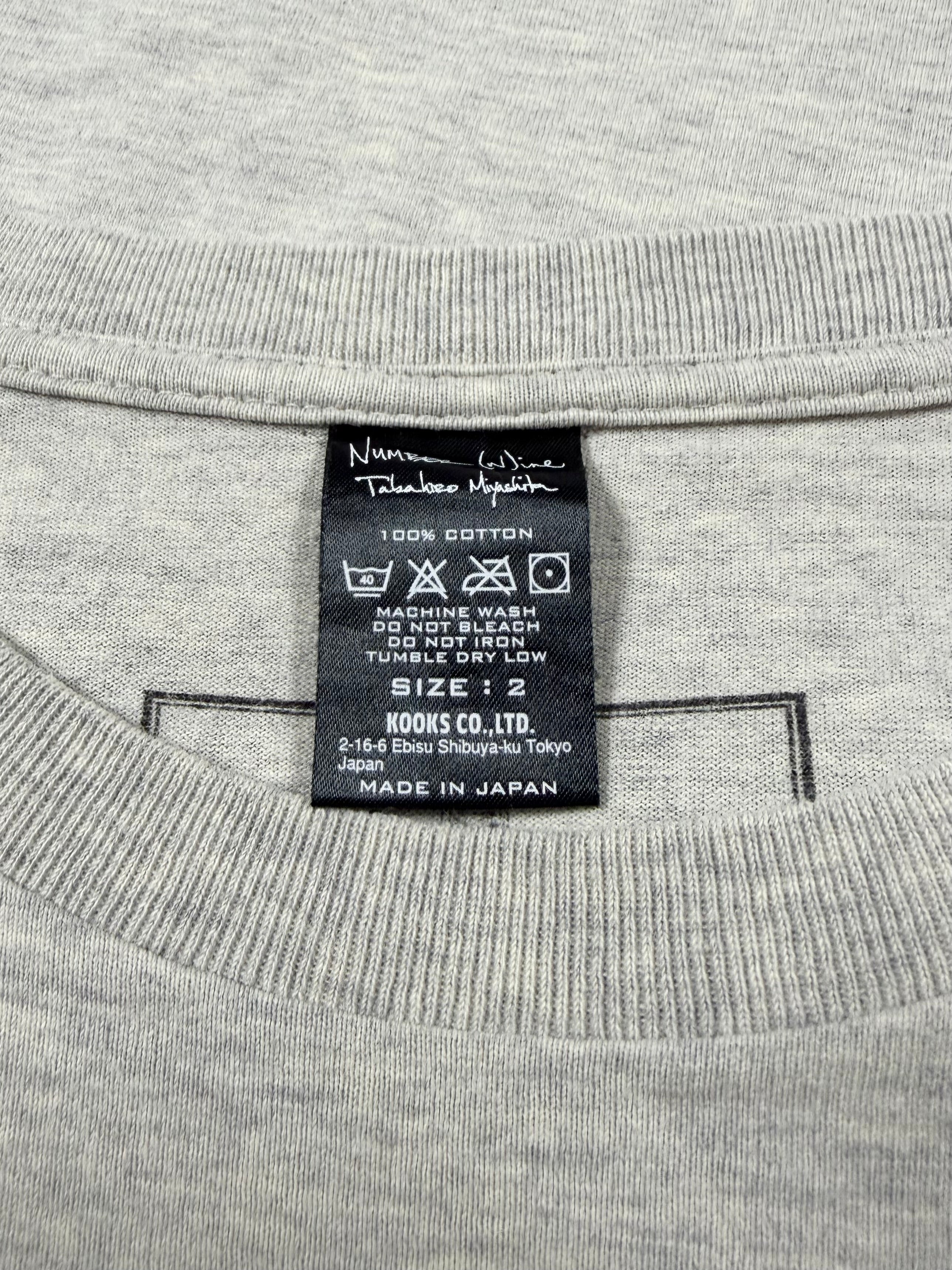 SS08 Number (N)ine ‘World Is One’ Folk Character Graphic T-Shirt