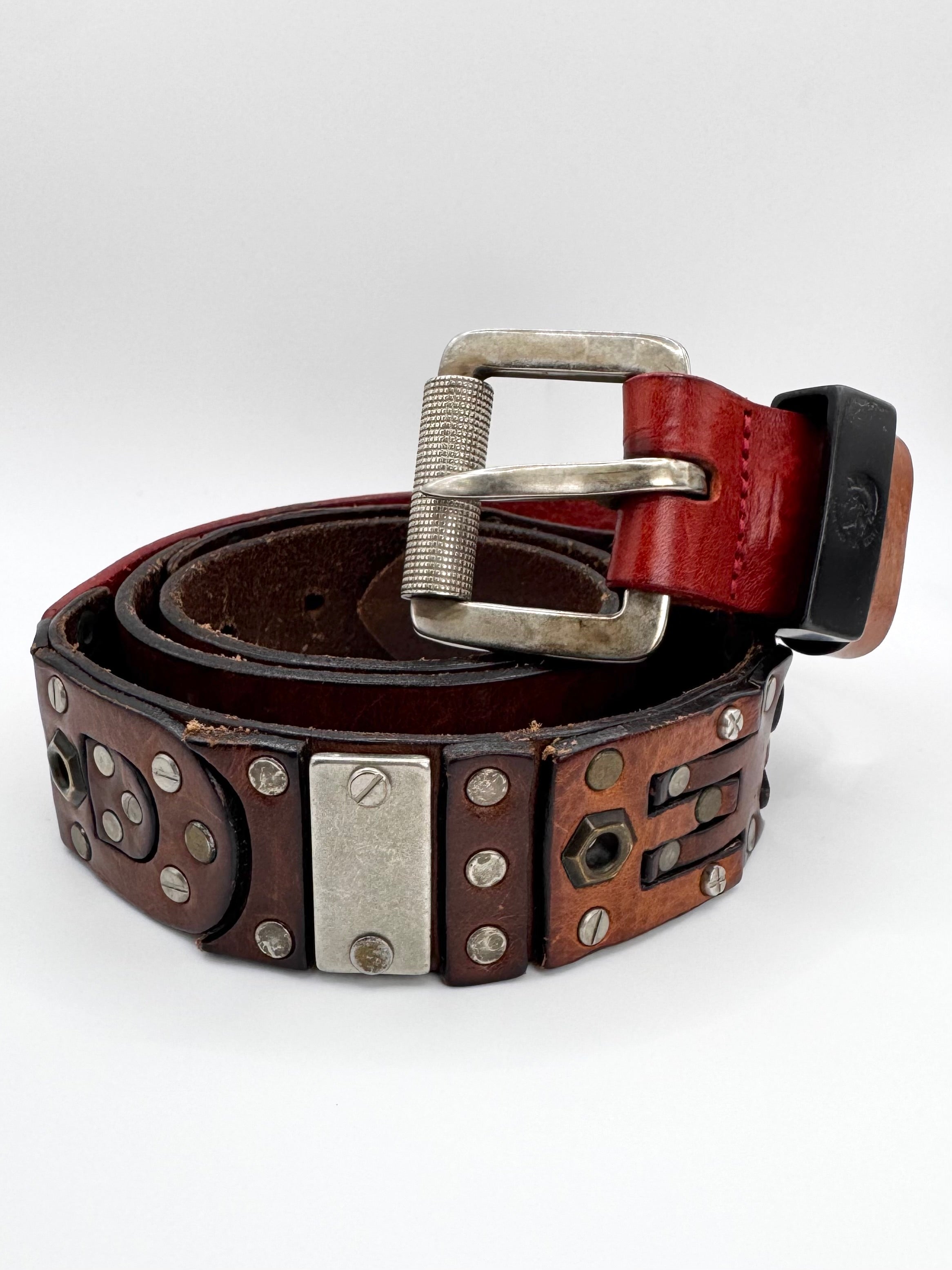 Vintage Diesel leather belt with embossed DIESEL panel logo and visible screws and bolt hardware
