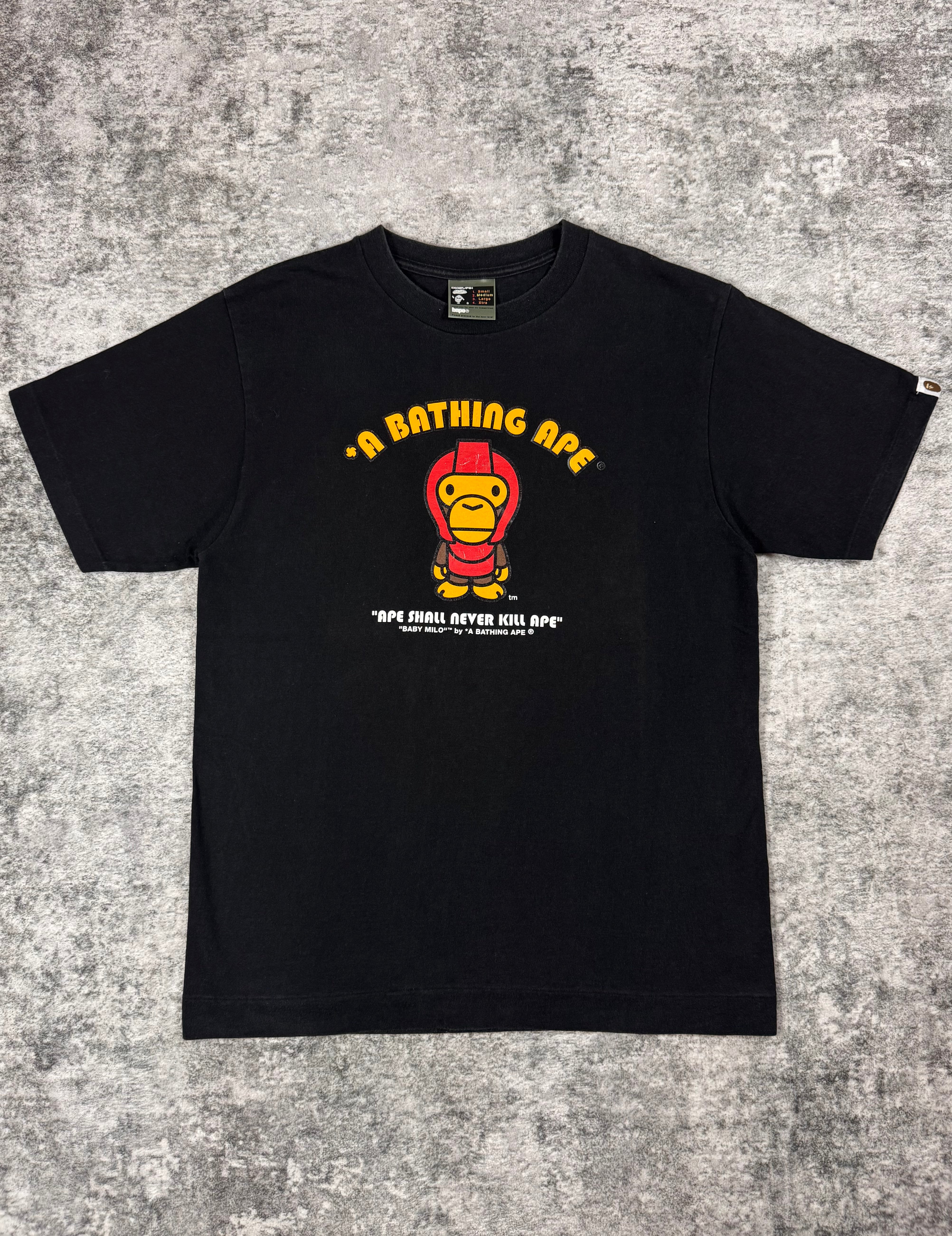 Mid-2000s BAPE Baby Milo black graphic T-shirt with front print, made in Japan