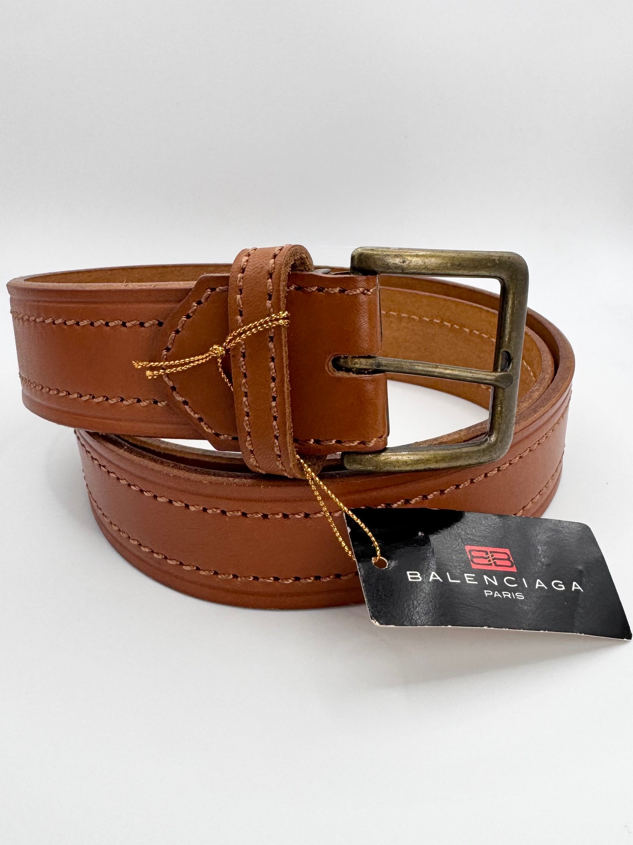 Vintage balenciaga belt in a tan color way with saddle stitching and brass buckle 