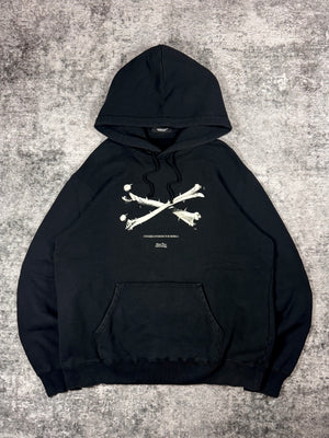Front view of AW21 Undercover black bone graphic hoodie with Undercoverism For Rebels print