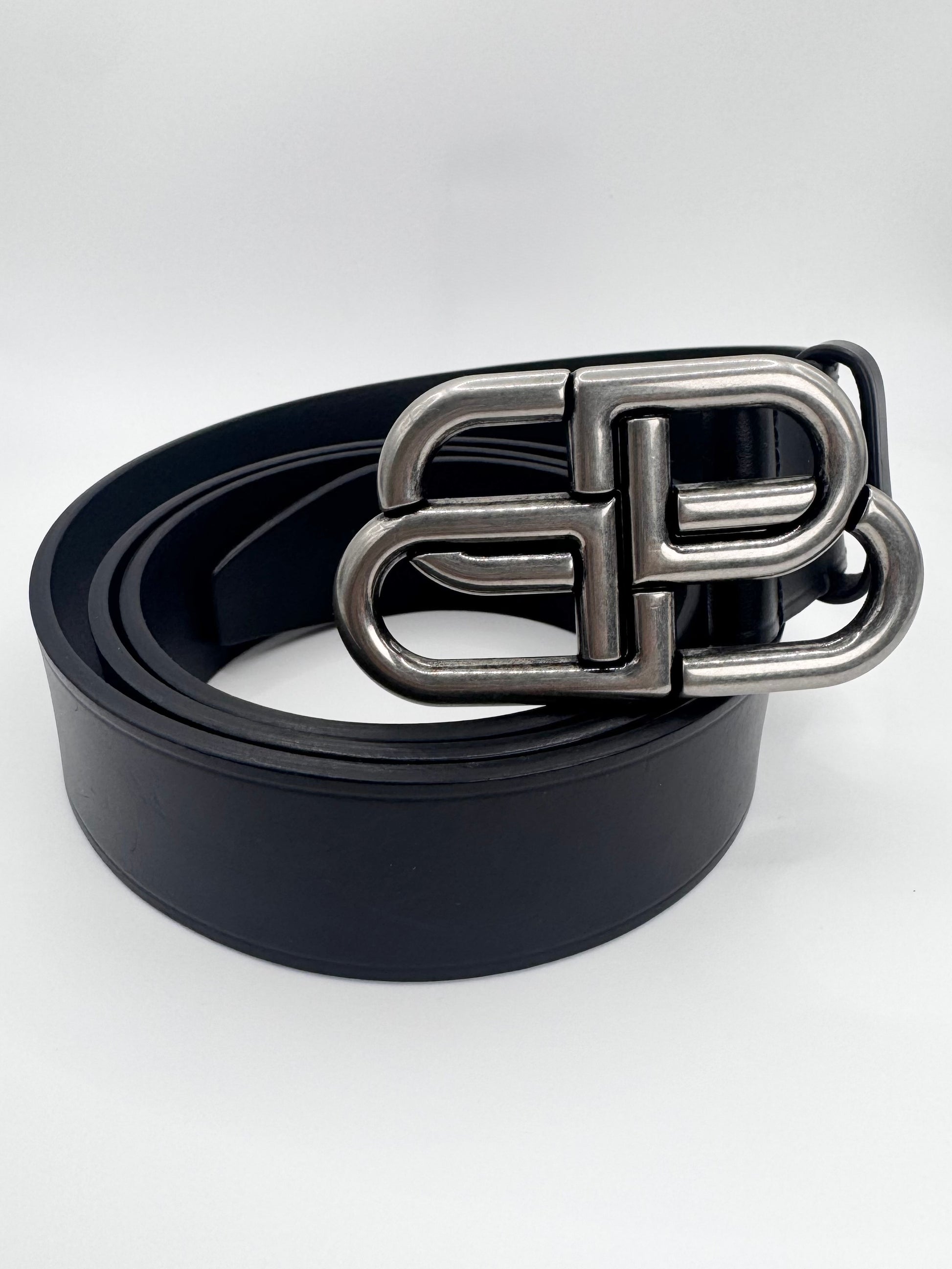 Balenciaga BB logo leather belt with antique silver interlocking buckle on white background