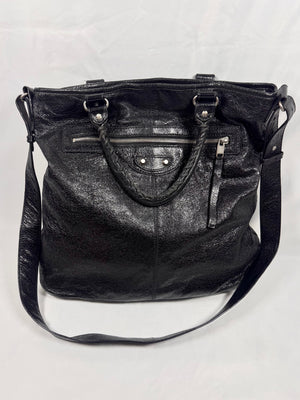 Balenciaga Motocross City black calfskin leather crossbody bag with shoulder strap On white background 