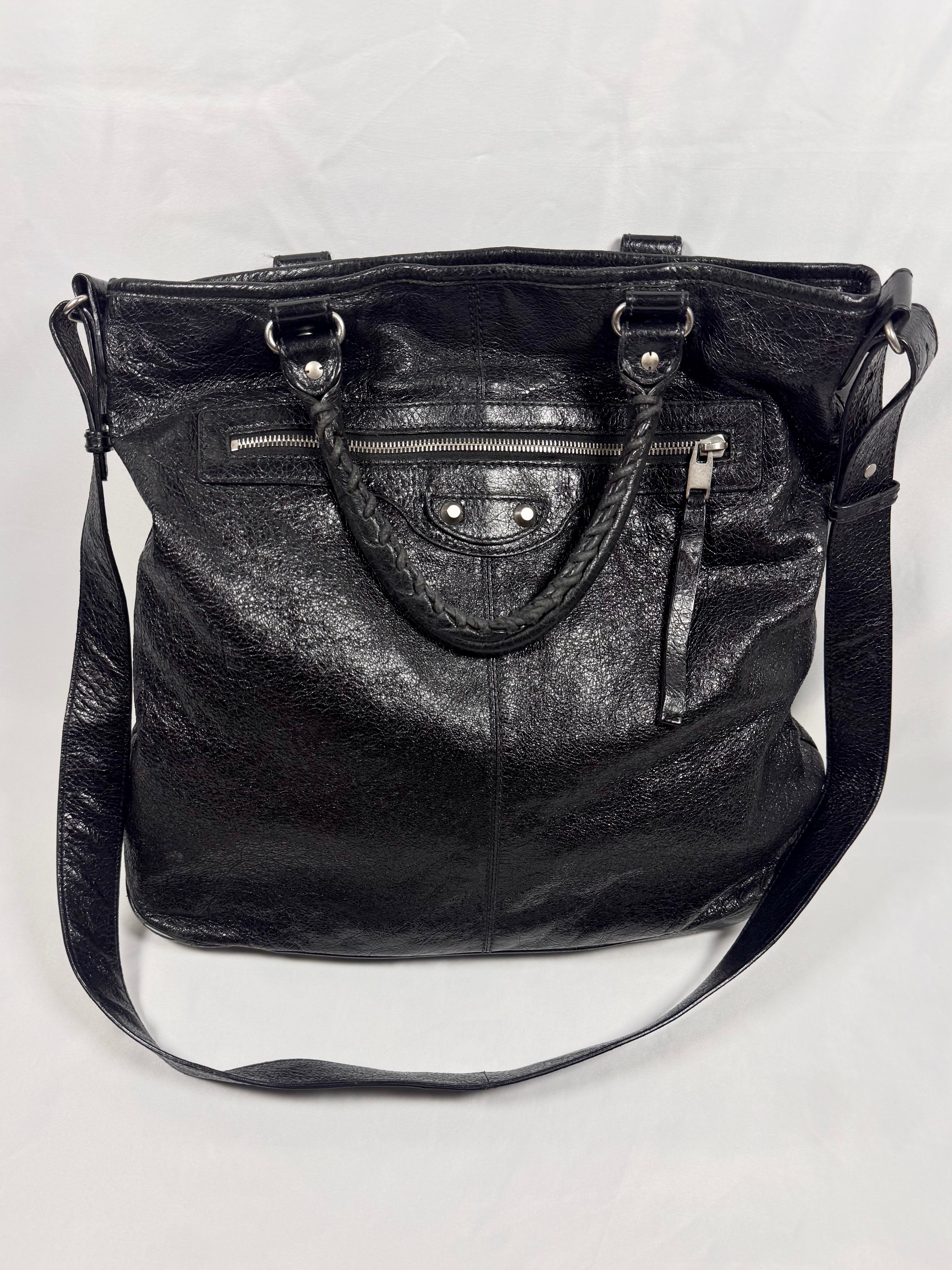 Balenciaga Motocross City black calfskin leather crossbody bag with shoulder strap On white background 