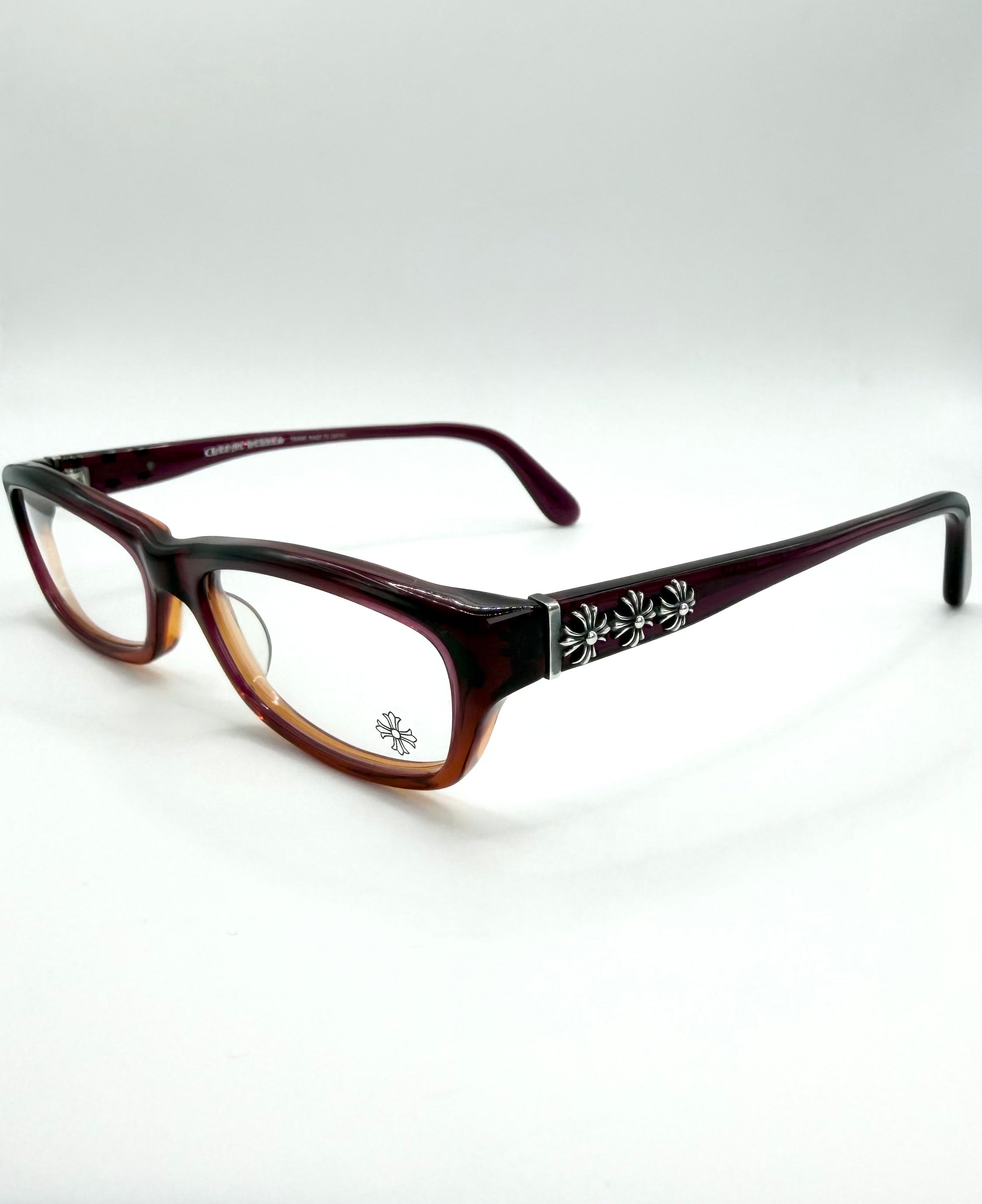 Chrome Hearts Eyeglasses with a cemetery cross design along the temple on a white background