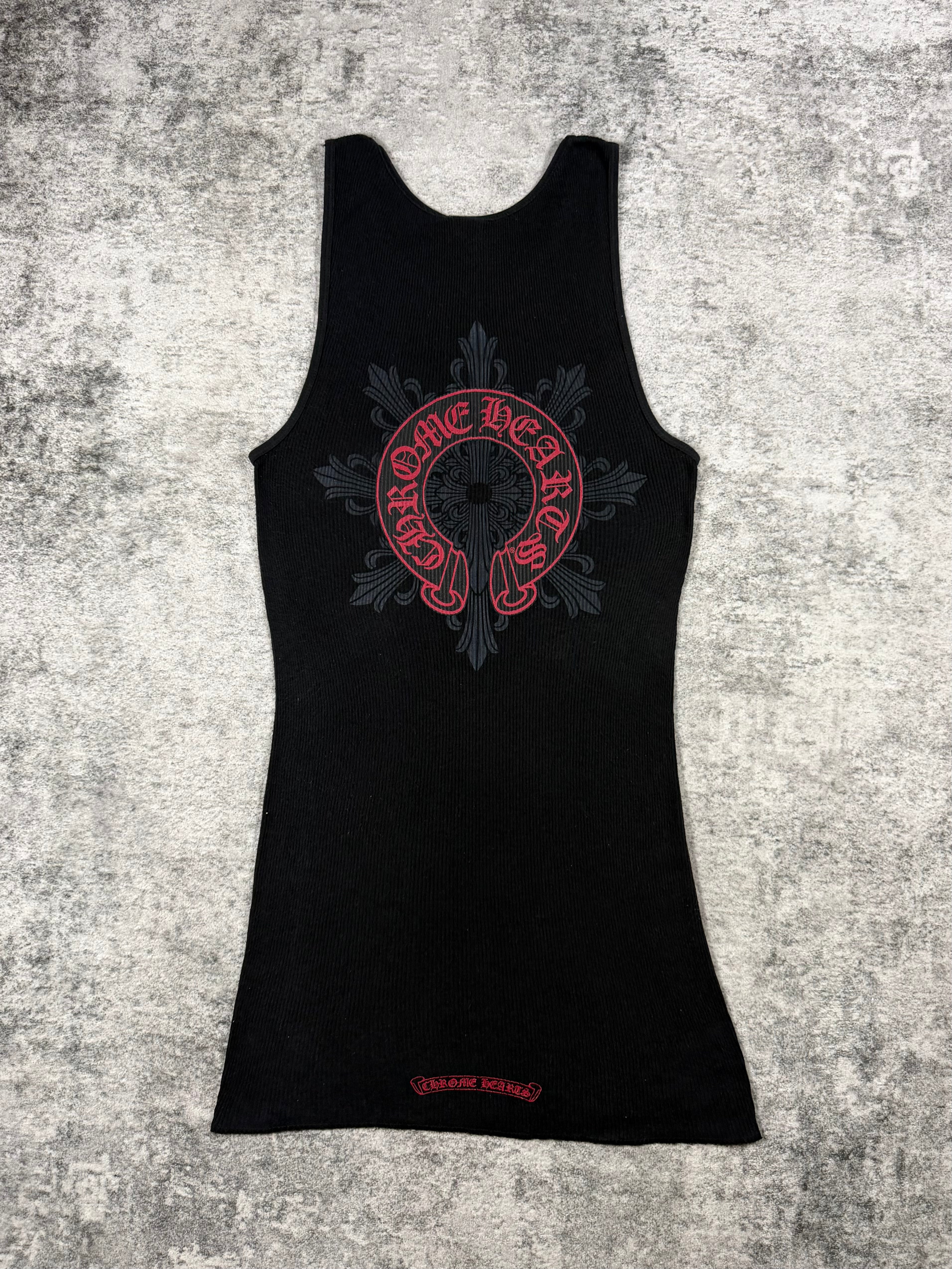 Vintage Chrome Hearts black ribbed tank top with red horseshoe graphic and tonal floral-cross back design, size M.