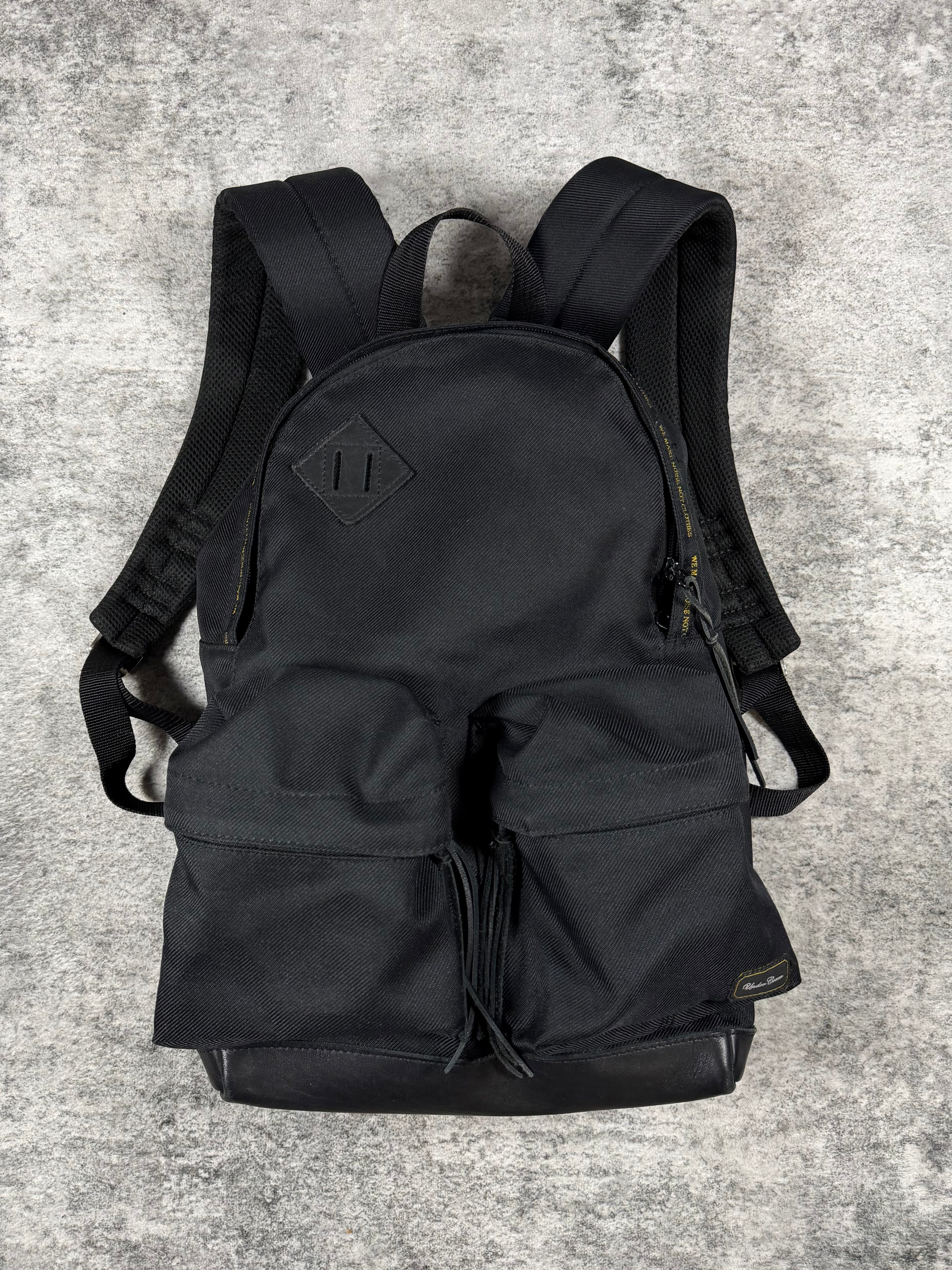 Undercover ‘Make Noise Not Clothes’ Black Canvas Backpack
