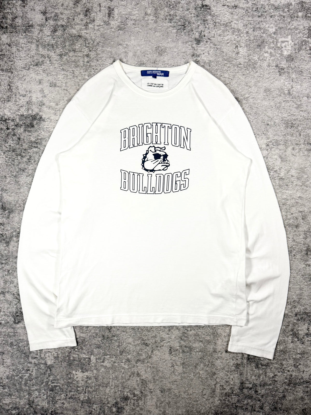Vintage Junya Watanabe MAN long sleeve in collaboration with 10 Corso Como inspired by collegiate American school wear featuring the Brighton Bulldogs graphic. 