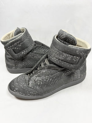 Maison Margiela Reflective Python Future High grey 3M sneakers with velcro strap and textured reptile pattern shown in studio lighting