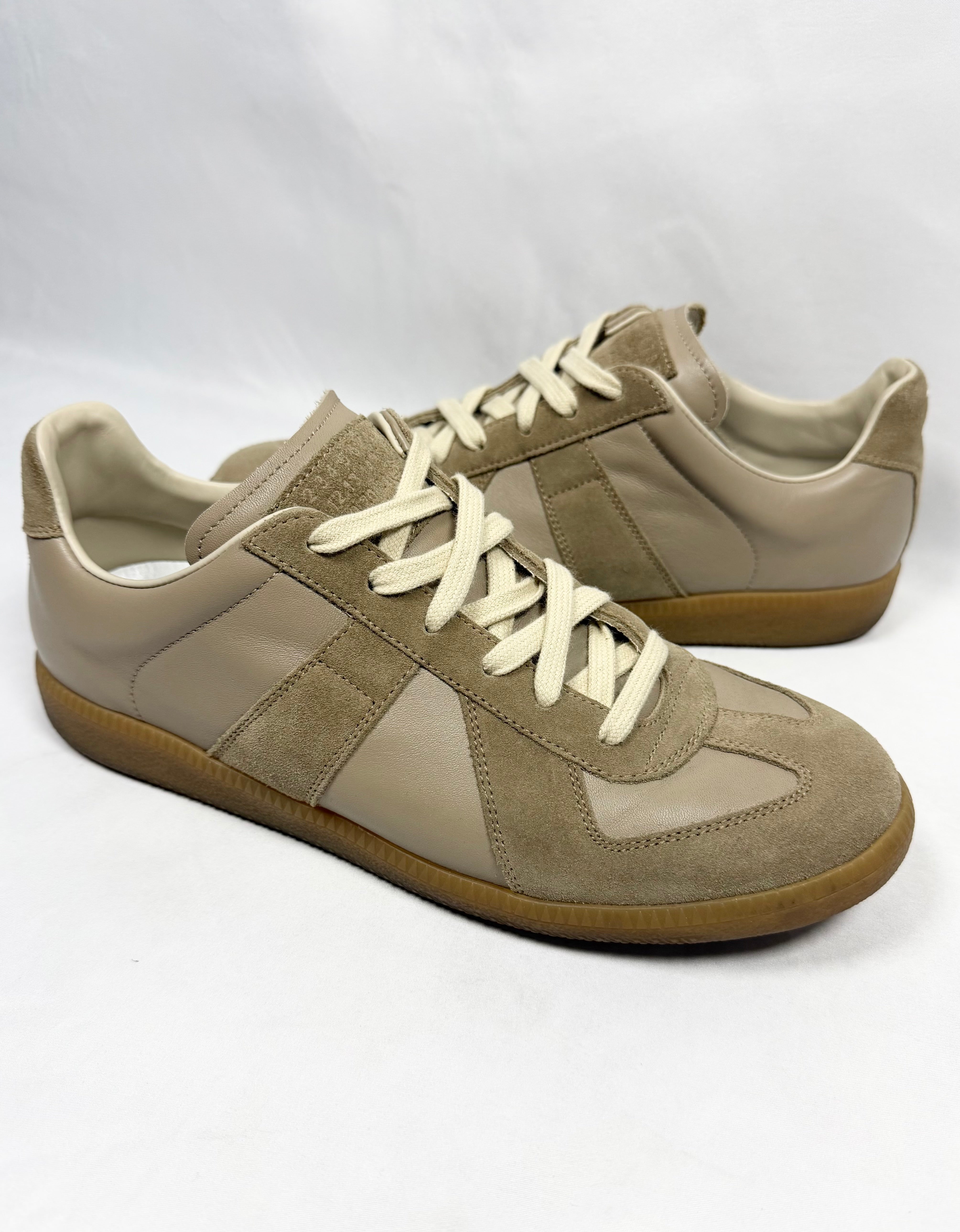 Maison Margiela Replica GAT sneakers in beige suede and leather, side profile on white background 