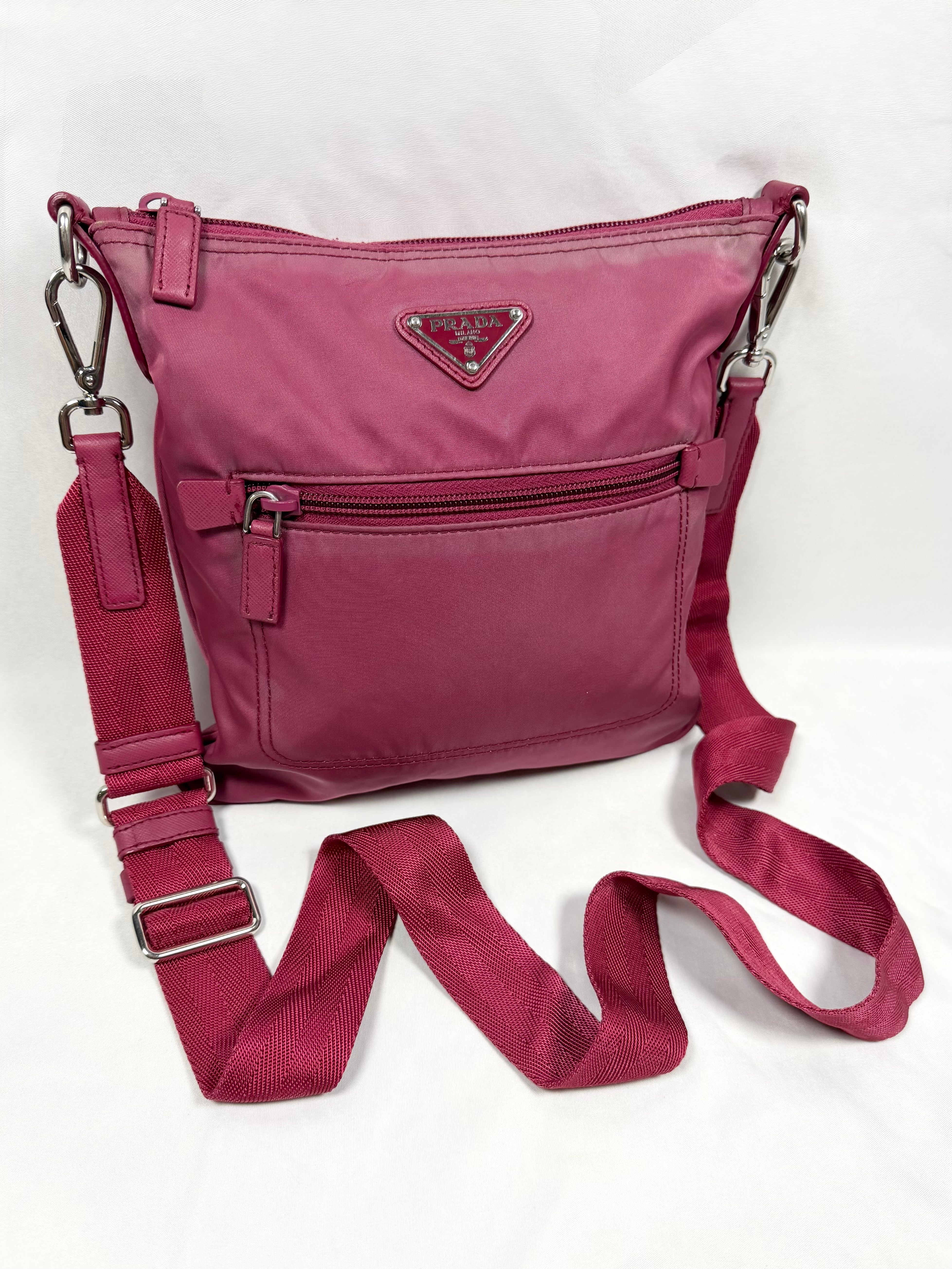 Prada fuchsia tessuto nylon crossbody bag front view with logo plaque