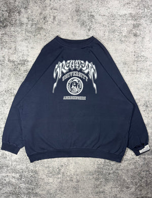 Raf Simons ‘Sreapers University’ Oversized Distress Crewneck from 2022 featuring collegiate inspired logo with a skeleton laid on a grey carpet