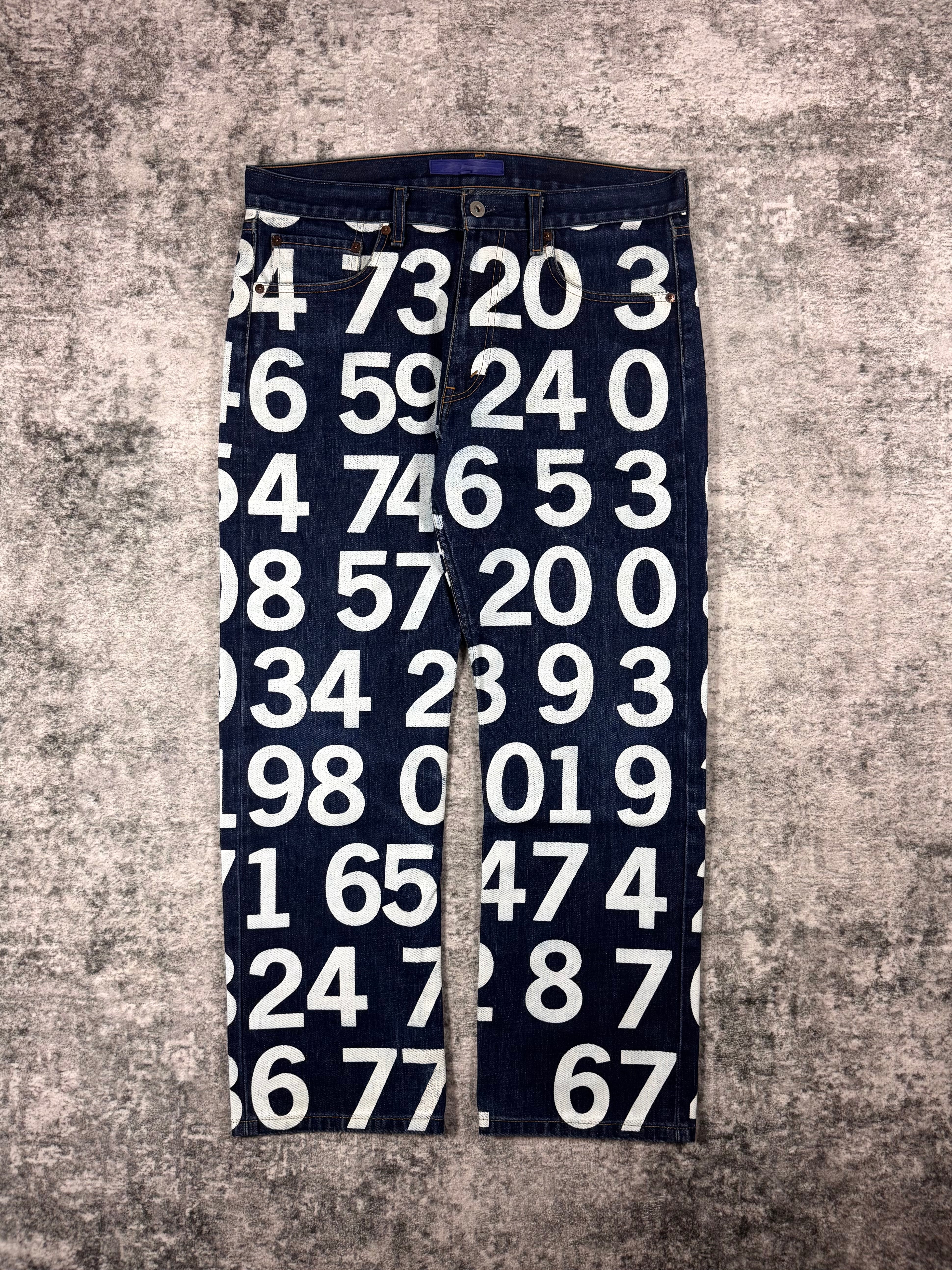 Junya Watanabe SS03 numbers graphic print indigo denim jeans front view with all-over numeric typography print made in Japan