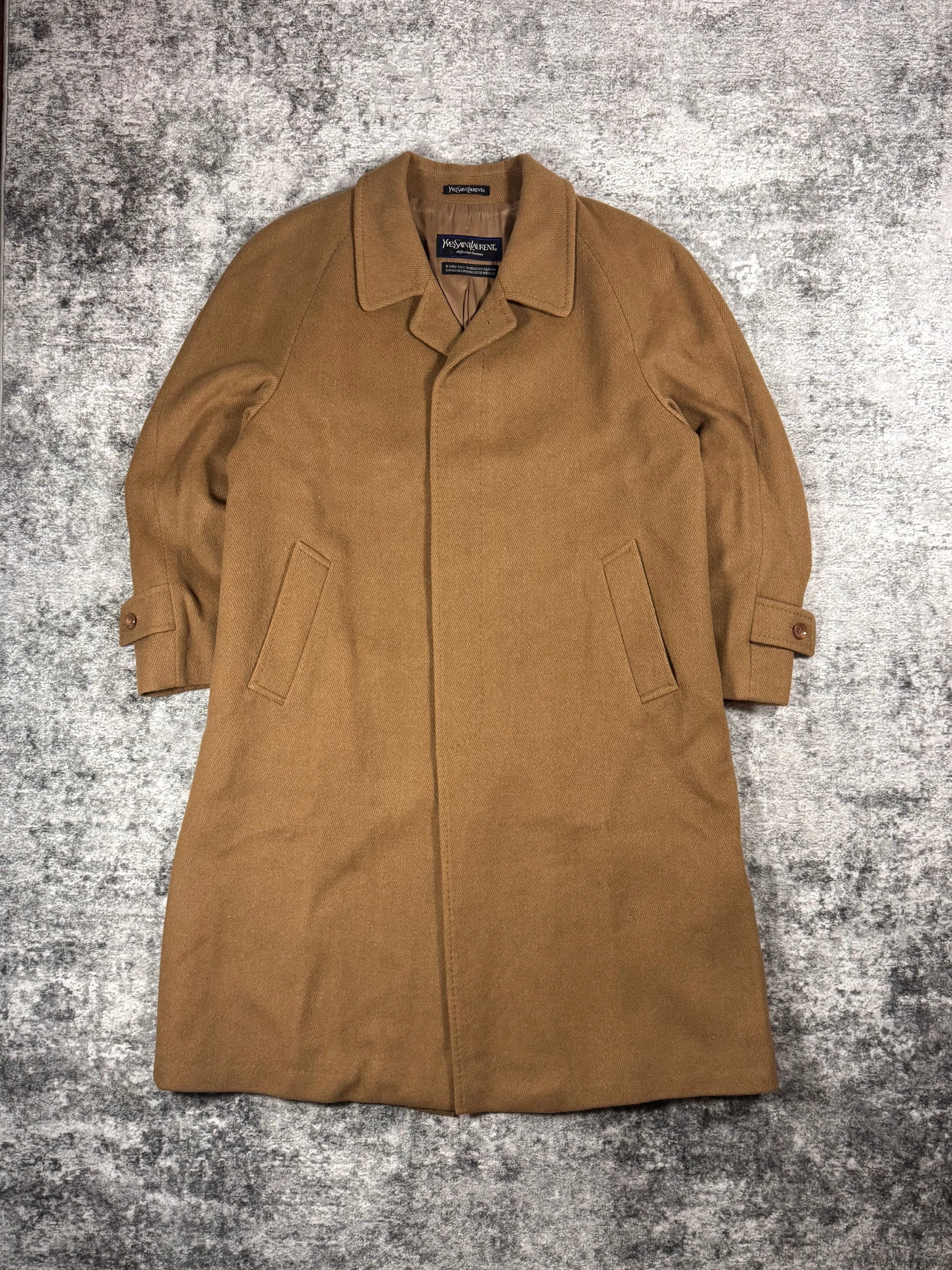 Vintage Yves Saint Laurent camel wool overcoat from Diffusion Hommes line with raglan sleeves and concealed front placket.